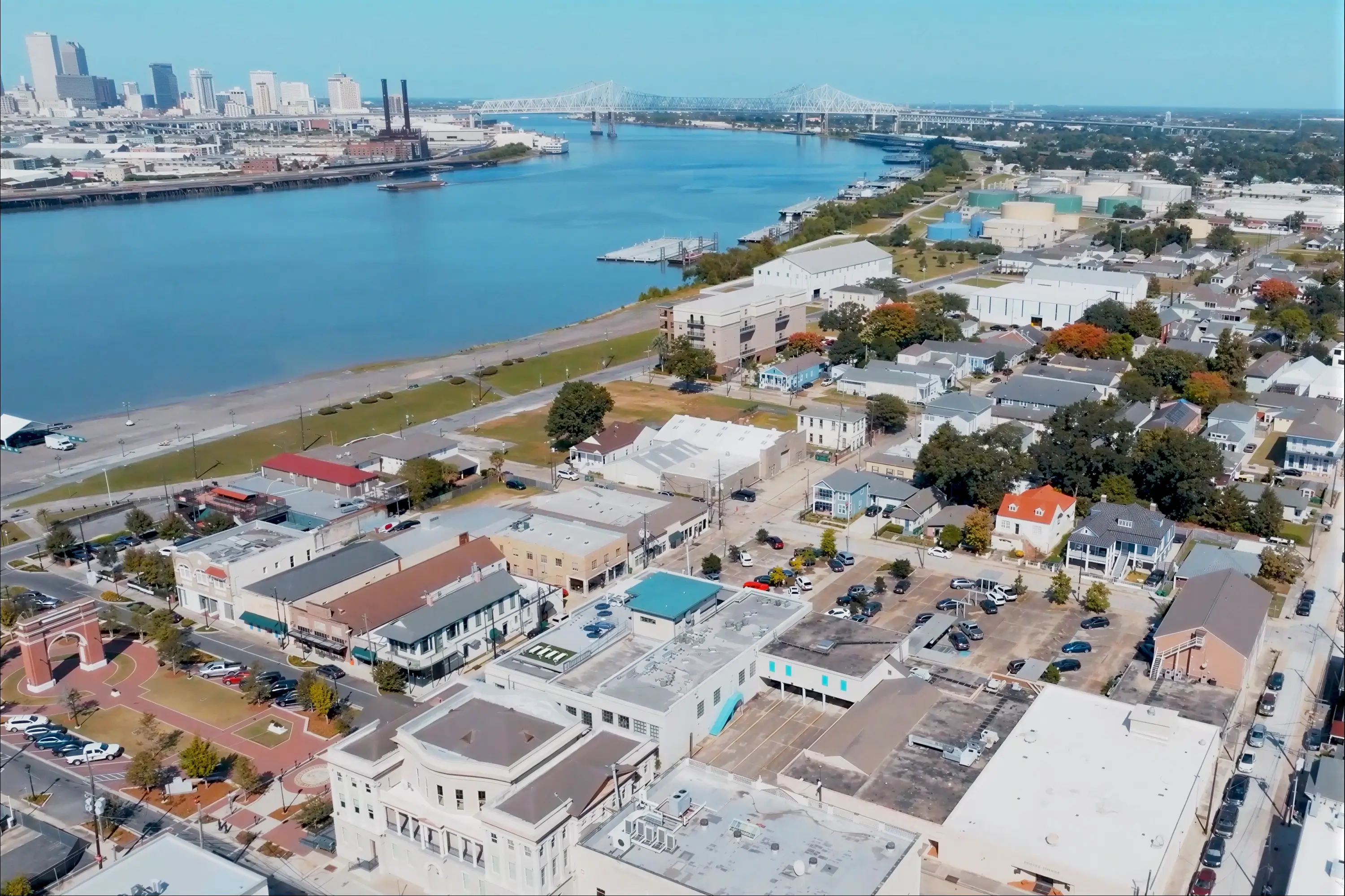 A drone shot of Gretna with the city in the background